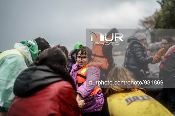  Migrants approach the coast of the northeastern Greek island of Lesbos on Thursday, Nov. 28, 2015. About 5,000 migrants are reaching Europe...