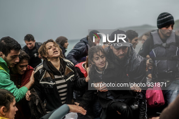  Migrants approach the coast of the northeastern Greek island of Lesbos on Thursday, Nov. 28, 2015. About 5,000 migrants are reaching Europe...