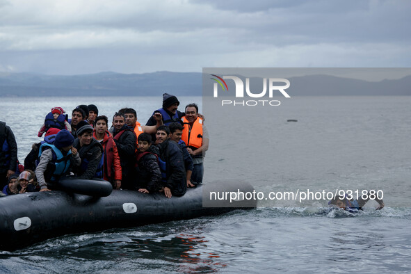  Migrants approach the coast of the northeastern Greek island of Lesbos on Thursday, Nov. 28, 2015. About 5,000 migrants are reaching Europe...