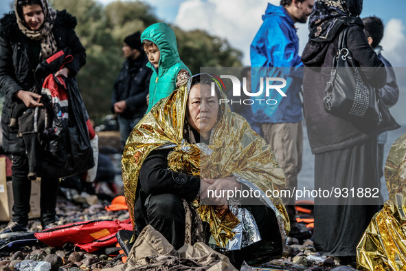  Migrants approach the coast of the northeastern Greek island of Lesbos on Thursday, Nov. 28, 2015. About 5,000 migrants are reaching Europe...