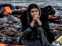  Migrants approach the coast of the northeastern Greek island of Lesbos on Thursday, Nov. 28, 2015. About 5,000 migrants are reaching Europe...