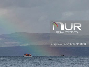  Migrants approach the coast of the northeastern Greek island of Lesbos on Thursday, Nov. 28, 2015. About 5,000 migrants are reaching Europe...