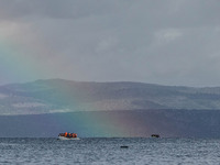  Migrants approach the coast of the northeastern Greek island of Lesbos on Thursday, Nov. 28, 2015. About 5,000 migrants are reaching Europe...