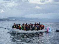  Migrants approach the coast of the northeastern Greek island of Lesbos on Thursday, Nov. 28, 2015. About 5,000 migrants are reaching Europe...