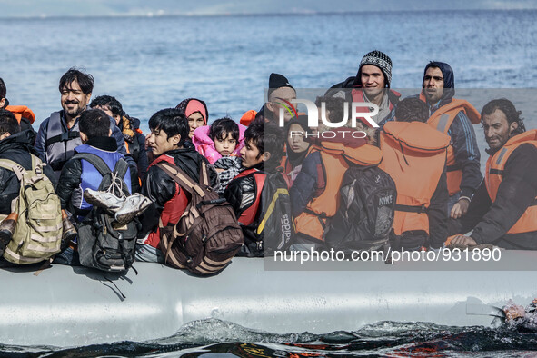  Migrants approach the coast of the northeastern Greek island of Lesbos on Thursday, Nov. 28, 2015. About 5,000 migrants are reaching Europe...