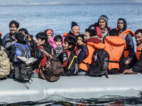  Migrants approach the coast of the northeastern Greek island of Lesbos on Thursday, Nov. 28, 2015. About 5,000 migrants are reaching Europe...