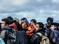  Migrants approach the coast of the northeastern Greek island of Lesbos on Thursday, Nov. 28, 2015. About 5,000 migrants are reaching Europe...