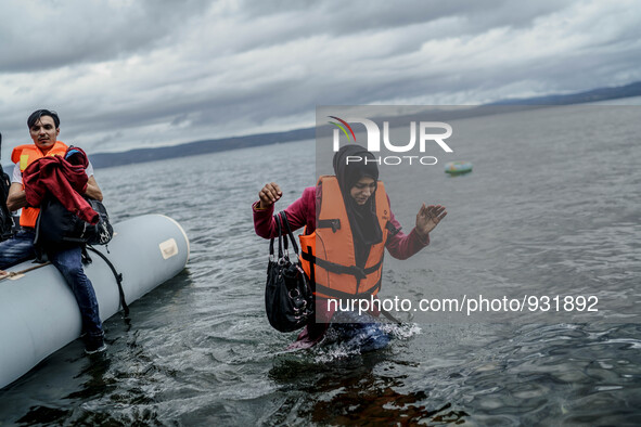  Migrants approach the coast of the northeastern Greek island of Lesbos on Thursday, Nov. 28, 2015. About 5,000 migrants are reaching Europe...