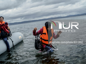  Migrants approach the coast of the northeastern Greek island of Lesbos on Thursday, Nov. 28, 2015. About 5,000 migrants are reaching Europe...