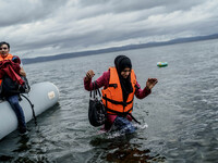  Migrants approach the coast of the northeastern Greek island of Lesbos on Thursday, Nov. 28, 2015. About 5,000 migrants are reaching Europe...