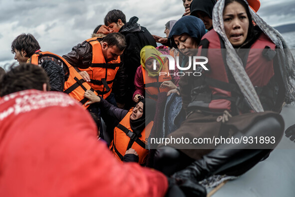  Migrants approach the coast of the northeastern Greek island of Lesbos on Thursday, Nov. 28, 2015. About 5,000 migrants are reaching Europe...