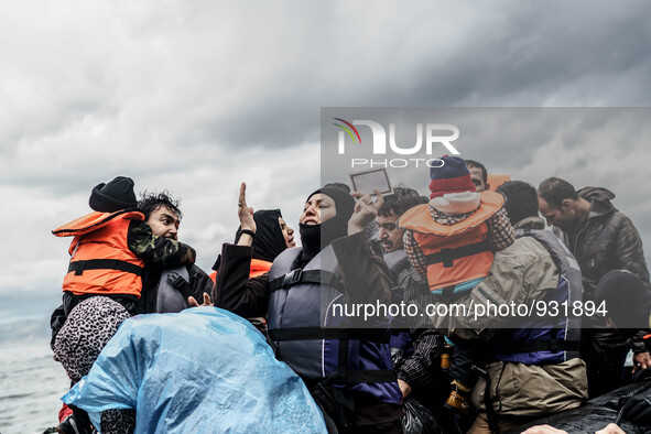  Migrants approach the coast of the northeastern Greek island of Lesbos on Thursday, Nov. 28, 2015. About 5,000 migrants are reaching Europe...