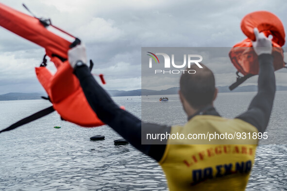  Migrants approach the coast of the northeastern Greek island of Lesbos on Thursday, Nov. 28, 2015. About 5,000 migrants are reaching Europe...