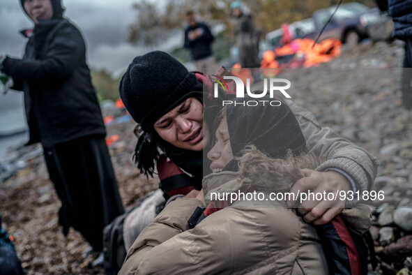  Migrants approach the coast of the northeastern Greek island of Lesbos on Thursday, Nov. 28, 2015. About 5,000 migrants are reaching Europe...