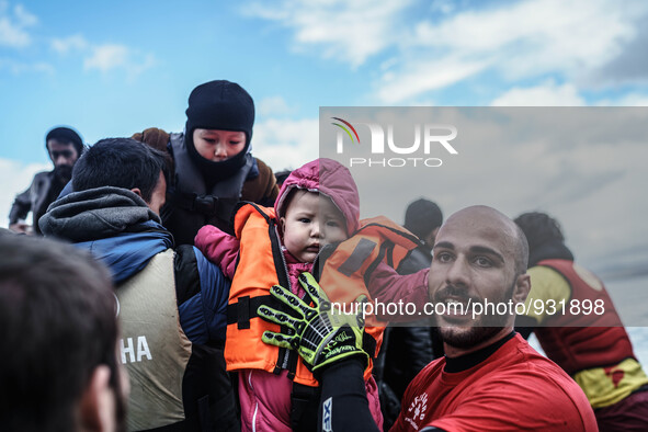  Migrants approach the coast of the northeastern Greek island of Lesbos on Thursday, Nov. 28, 2015. About 5,000 migrants are reaching Europe...