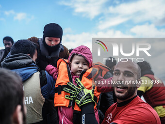  Migrants approach the coast of the northeastern Greek island of Lesbos on Thursday, Nov. 28, 2015. About 5,000 migrants are reaching Europe...