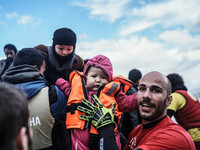  Migrants approach the coast of the northeastern Greek island of Lesbos on Thursday, Nov. 28, 2015. About 5,000 migrants are reaching Europe...