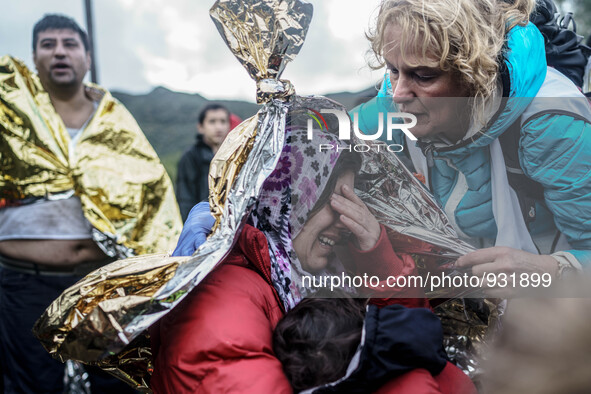  Migrants approach the coast of the northeastern Greek island of Lesbos on Thursday, Nov. 28, 2015. About 5,000 migrants are reaching Europe...