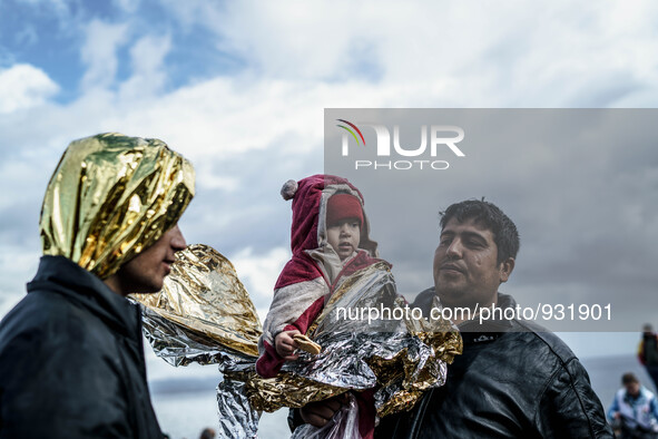  Migrants approach the coast of the northeastern Greek island of Lesbos on Thursday, Nov. 28, 2015. About 5,000 migrants are reaching Europe...