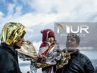  Migrants approach the coast of the northeastern Greek island of Lesbos on Thursday, Nov. 28, 2015. About 5,000 migrants are reaching Europe...