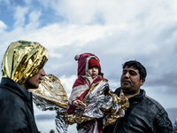  Migrants approach the coast of the northeastern Greek island of Lesbos on Thursday, Nov. 28, 2015. About 5,000 migrants are reaching Europe...