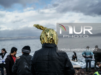  Migrants approach the coast of the northeastern Greek island of Lesbos on Thursday, Nov. 28, 2015. About 5,000 migrants are reaching Europe...