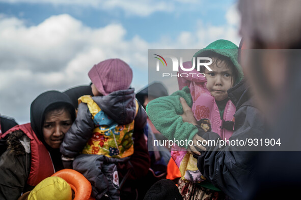  Migrants approach the coast of the northeastern Greek island of Lesbos on Thursday, Nov. 28, 2015. About 5,000 migrants are reaching Europe...