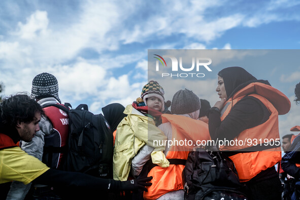  Migrants approach the coast of the northeastern Greek island of Lesbos on Thursday, Nov. 28, 2015. About 5,000 migrants are reaching Europe...