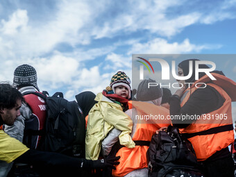  Migrants approach the coast of the northeastern Greek island of Lesbos on Thursday, Nov. 28, 2015. About 5,000 migrants are reaching Europe...