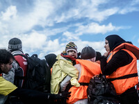  Migrants approach the coast of the northeastern Greek island of Lesbos on Thursday, Nov. 28, 2015. About 5,000 migrants are reaching Europe...