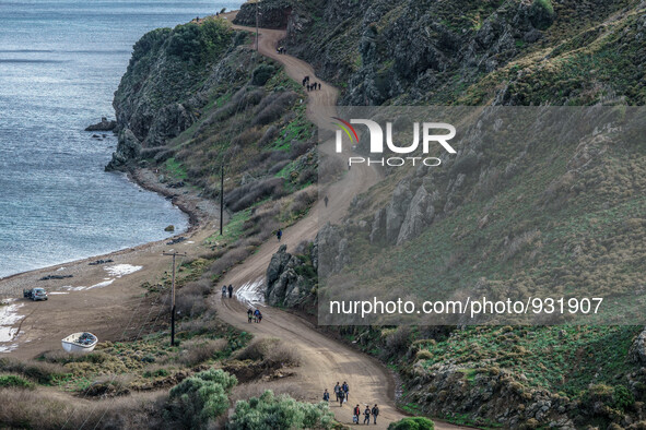  Migrants approach the coast of the northeastern Greek island of Lesbos on Thursday, Nov. 28, 2015. About 5,000 migrants are reaching Europe...