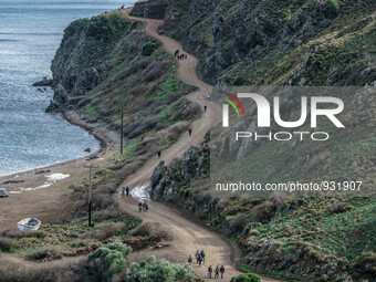  Migrants approach the coast of the northeastern Greek island of Lesbos on Thursday, Nov. 28, 2015. About 5,000 migrants are reaching Europe...