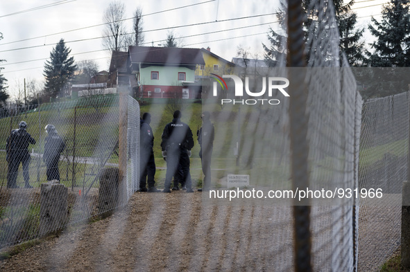 Police wait the arrival of migrants in Sentilj, Slovenia, on November 28, 2015. About 5,000 migrants are reaching Europe each day along the...