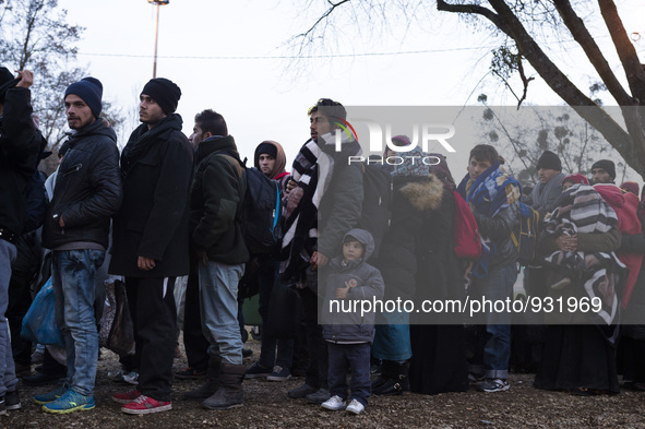 Migrants wait to be allowed to cross to Austria, in Sentilj, Slovenia. About 5,000 migrants are reaching Europe each day along the so-called...