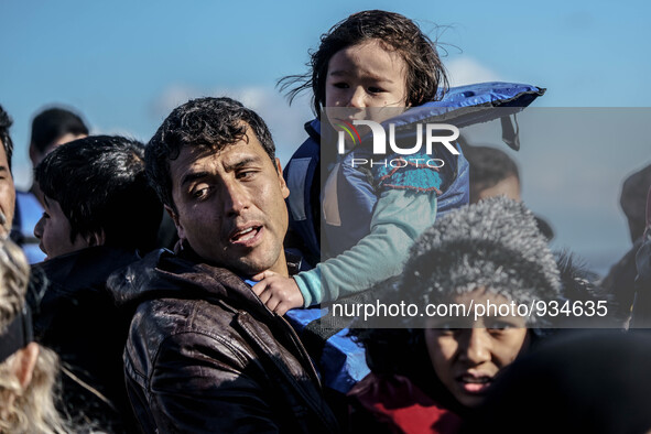  Migrants approach the coast of the northeastern Greek island of Lesbos on Thursday, Nov. 29, 2015. About 5,000 migrants are reaching Europe...