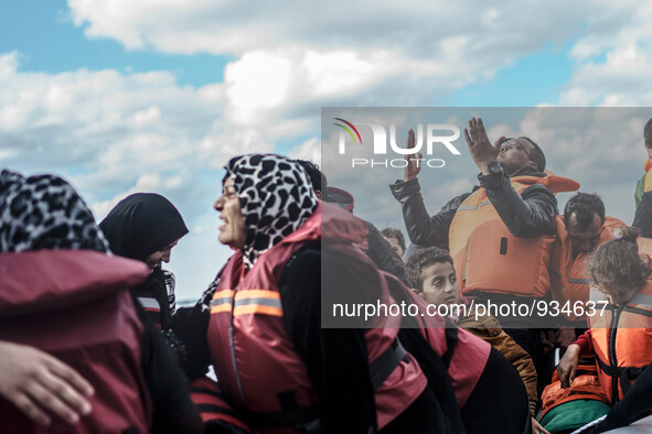  Migrants approach the coast of the northeastern Greek island of Lesbos on Thursday, Nov. 29, 2015. About 5,000 migrants are reaching Europe...