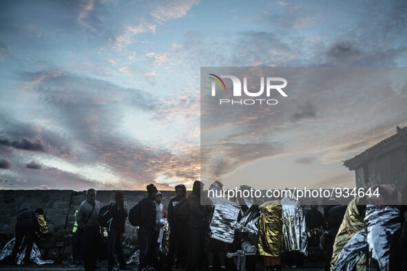  Migrants approach the coast of the northeastern Greek island of Lesbos on Thursday, Nov. 29, 2015. About 5,000 migrants are reaching Europe...