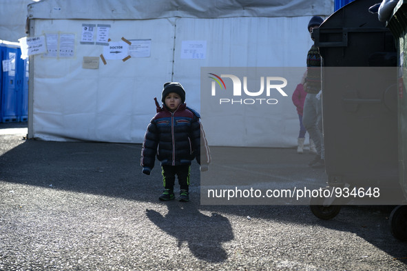 A Syrian child, inside the refugee camp in Sentilj on November 29, 2015. 