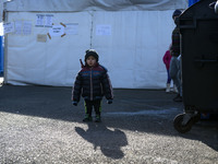 A Syrian child, inside the refugee camp in Sentilj on November 29, 2015. (