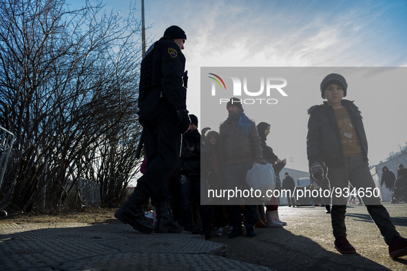 Hundreds of refugees after refreshments and taking warm clothes for the winter, continue their journey across the Slovenian border arriving...