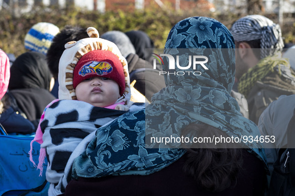 Hundreds of refugees after refreshments and taking warm clothes for the winter, continue their journey across the Slovenian border arriving...