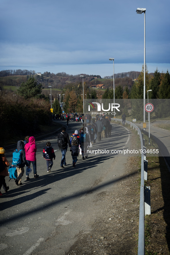 Hundreds of refugees after refreshments and taking warm clothes for the winter, continue their journey across the Slovenian border arriving...