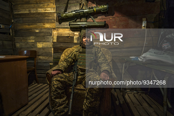 An ukrainian soldier takes a rest in his underground base after returning from the frontlines in Zaporizhia region. Russian shelling is cons...