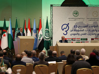 The director general of the Arab Association for Education, Culture and Science, Mohamed Ould Amar (L), during the opening of the proceeding...