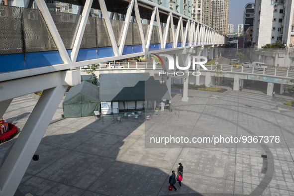 A General view showing a Covid-19 Community clinic under a bridge on December 29, 2022 in Macau, China. 