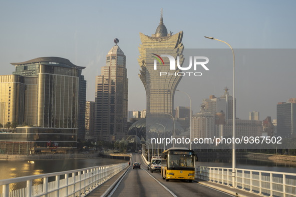 A General view showing traffic in front of the Grand Lisboa on December 29, 2022 in Macau, China. 