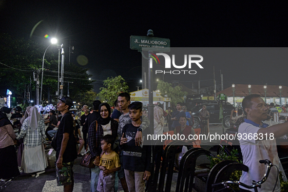 People gather at Malioboro Street during holiday for the end of the year in Yogyakarta, Indonesia on December 30, 2022, as Indonesian Presid...