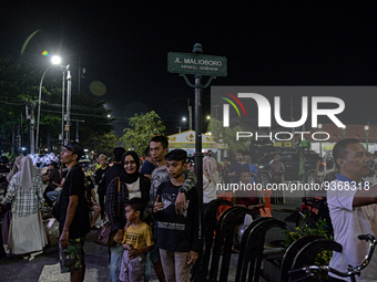 People gather at Malioboro Street during holiday for the end of the year in Yogyakarta, Indonesia on December 30, 2022, as Indonesian Presid...