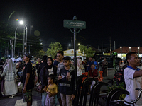 People gather at Malioboro Street during holiday for the end of the year in Yogyakarta, Indonesia on December 30, 2022, as Indonesian Presid...