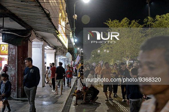 People gather at Malioboro Street during holiday for the end of the year in Yogyakarta, Indonesia on December 30, 2022, as Indonesian Presid...